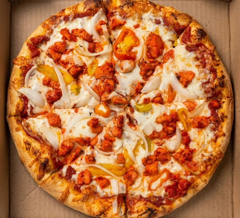 Tandoori Chicken Pizza, an Indian fusion pizza in Calgary